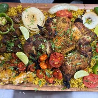 Bistro Platter (Whole Goat Rib, Beef Bihari, Beef Sheekh Kabab, & Chicken Boti With Rice & 2 Orders Of Naan